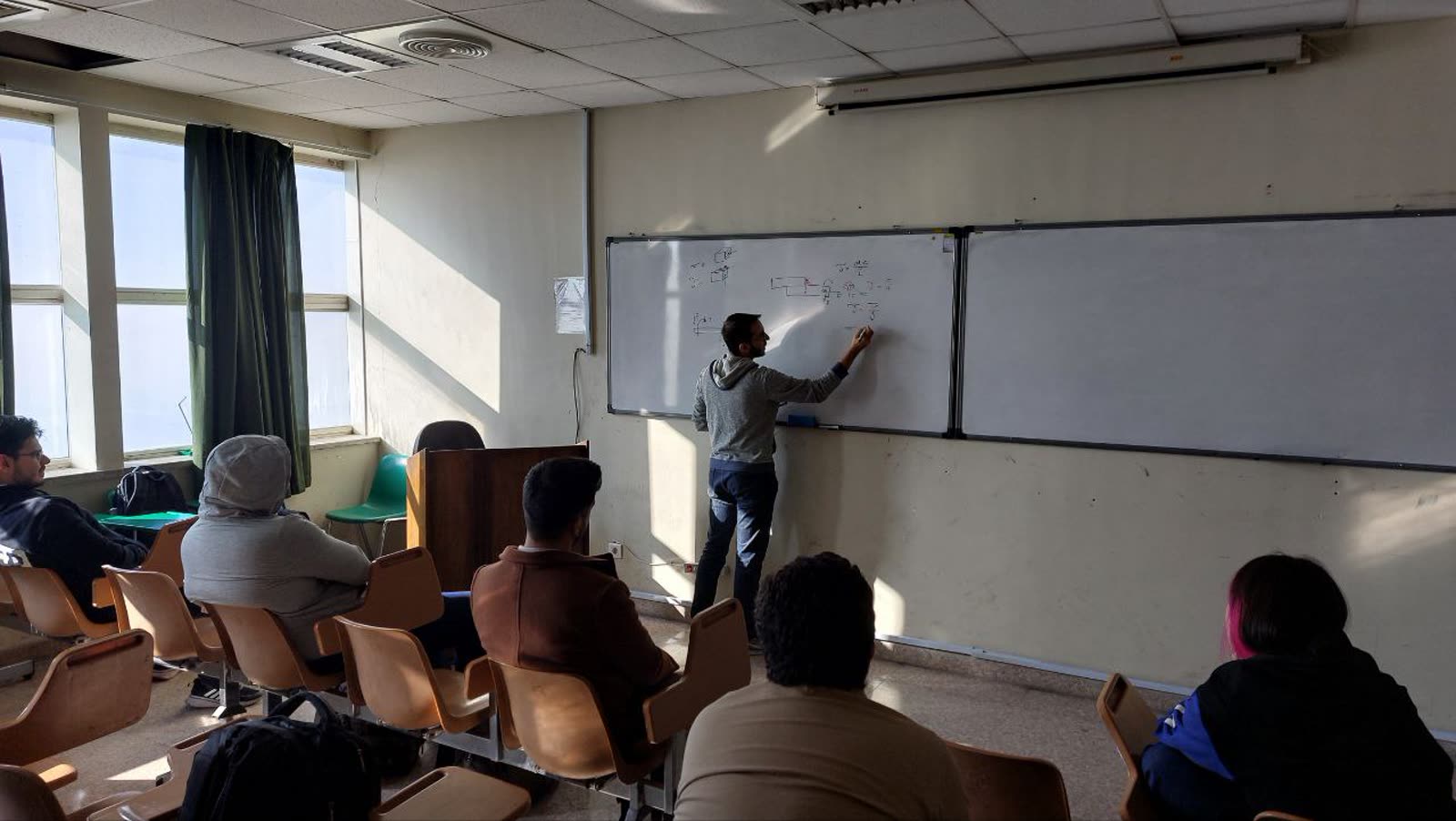 Teaching assistant session at the whiteboard
